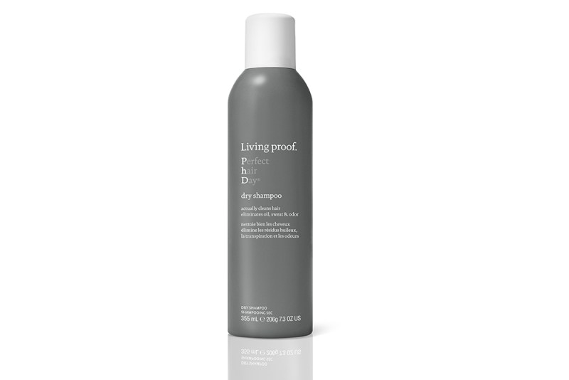 A bottle of Living Proof's dry shampoo on white background.