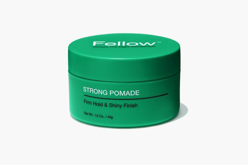 Fellow Barber Strong Pomade on a light grey backdrop