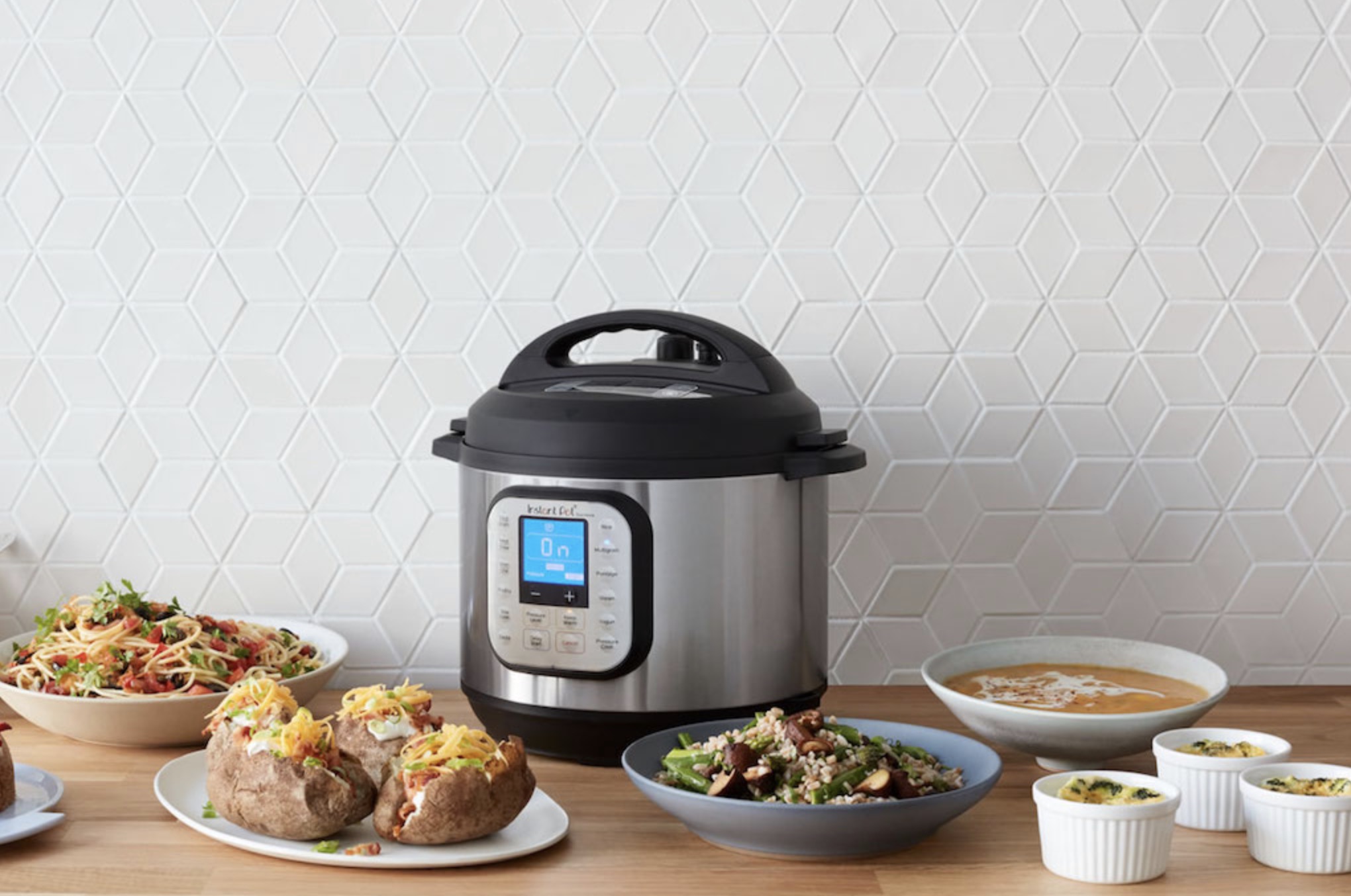 The Instant Pot Duo with several dishes.