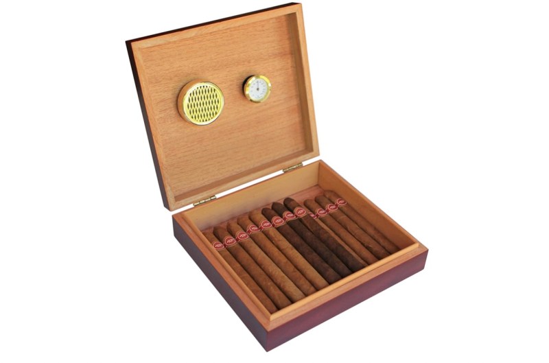 A wooden case full of cigars.