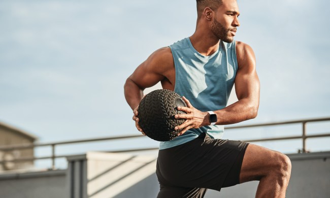 Man using a medicine ball during exercise.