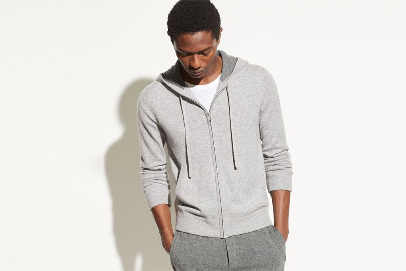Man wearing a grey cashmere hoodie and sweatpants.