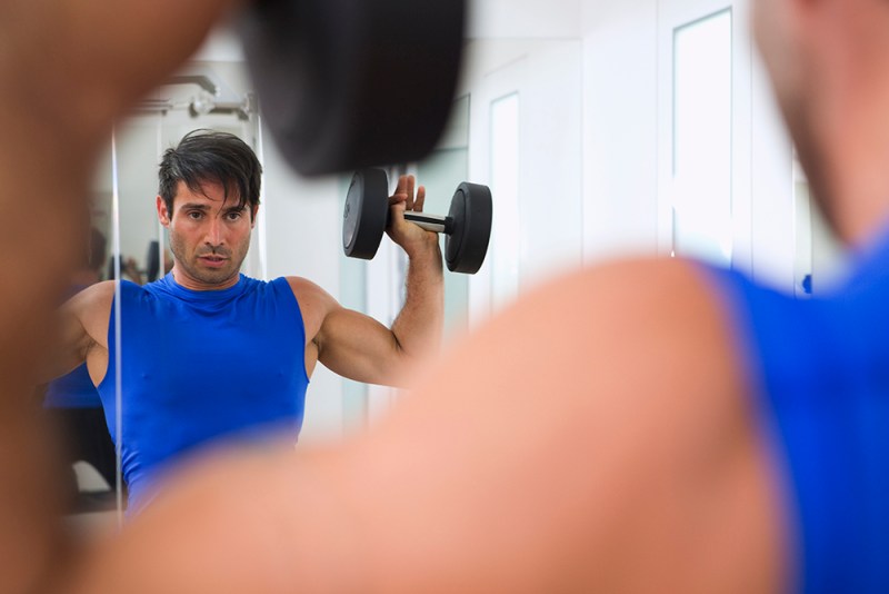 Lifting weights in the mirror.