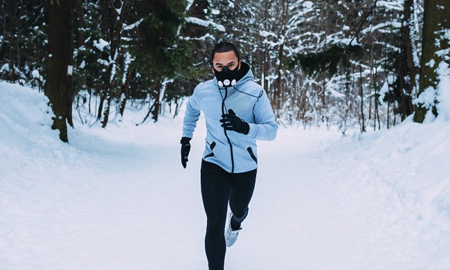 best running gloves portrait of male athlete on snow covered field