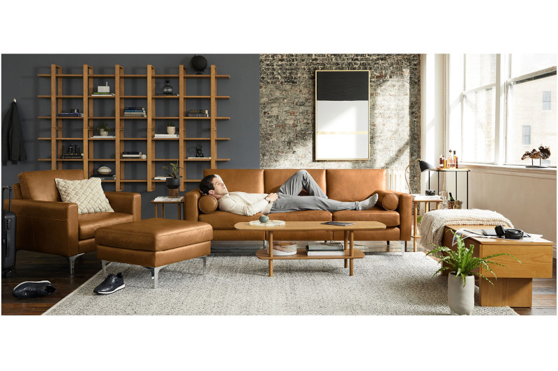 A man on a Burrow couch