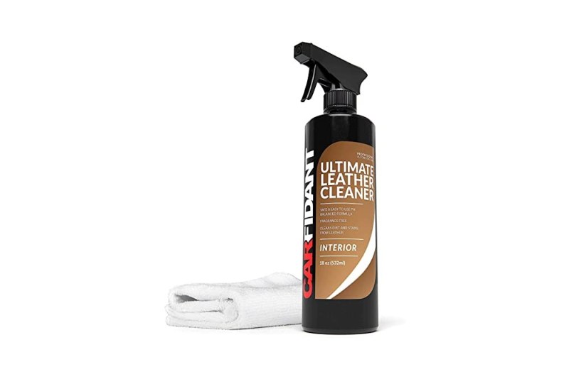 A spray bottle of Carfidant Ultimate Leather Cleaner.