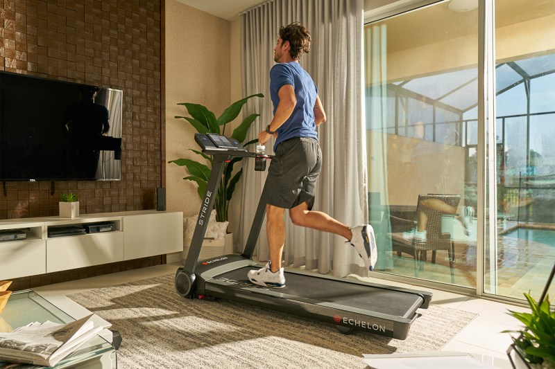 Man running on Eschelon Stride treadmill.
