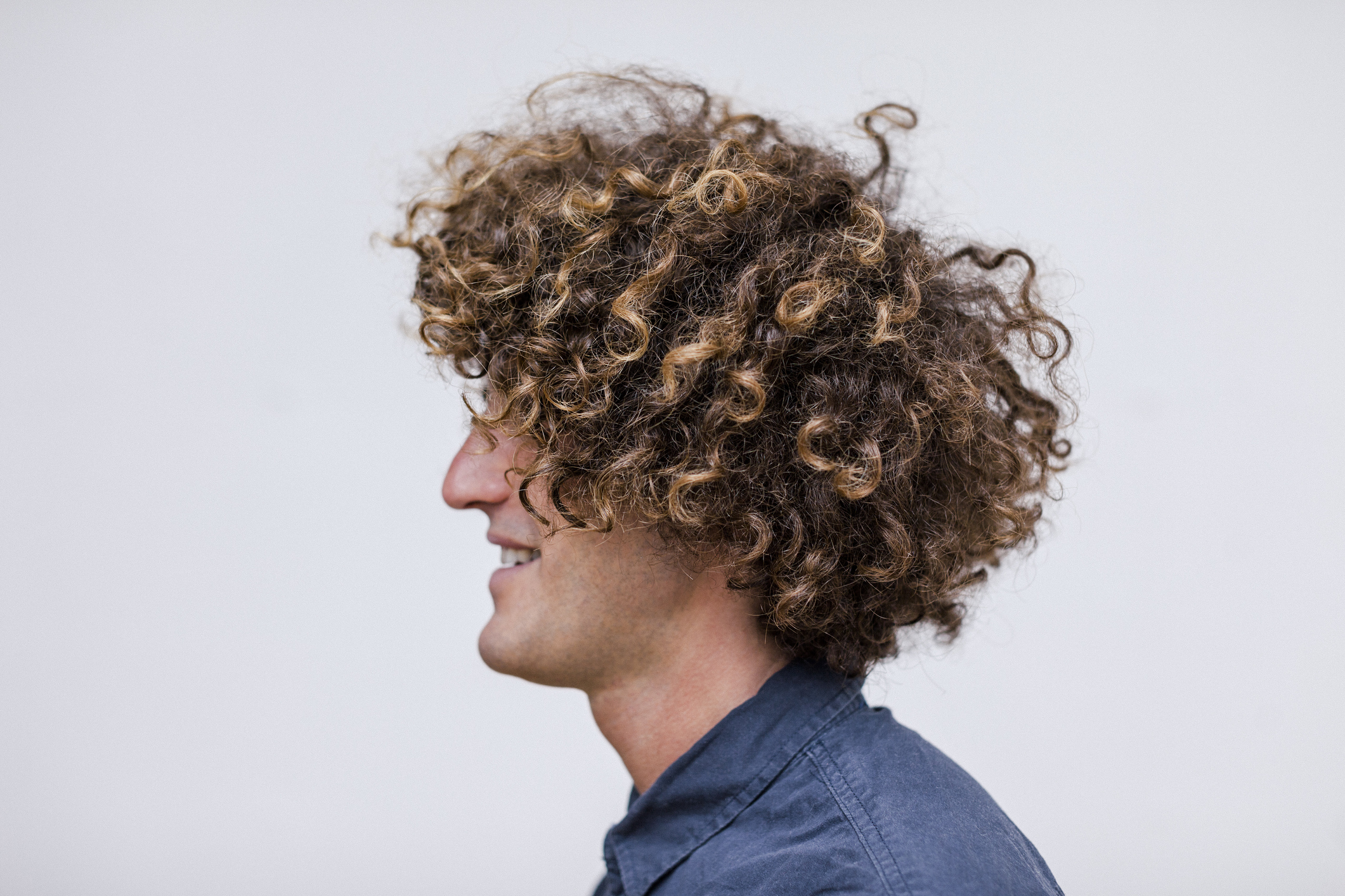 How To Get And Style Curly Hair Men Like To Sport | LoveHairStyles.com