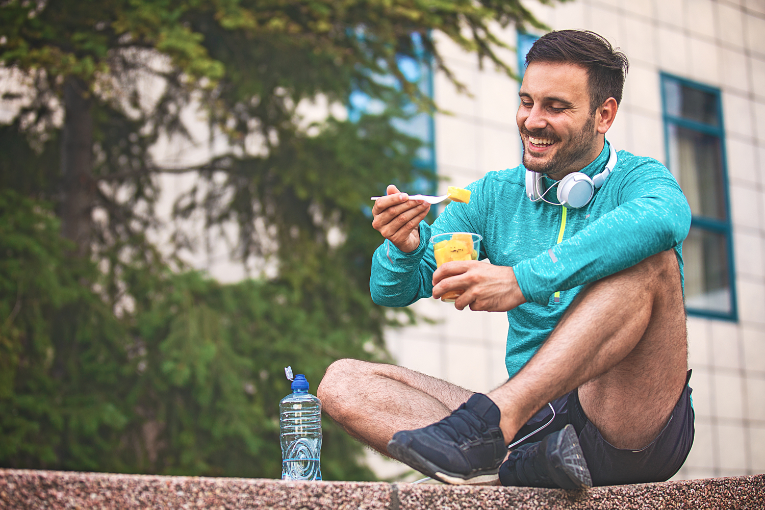 Man eating fruit.