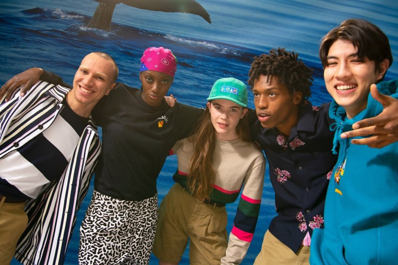 Group of people wearing Noah taking a selfie