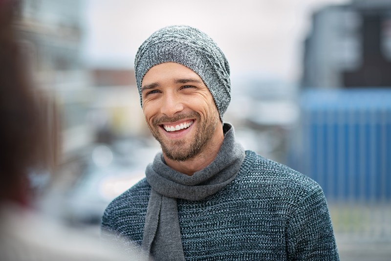 Man in winter sweater and beanie