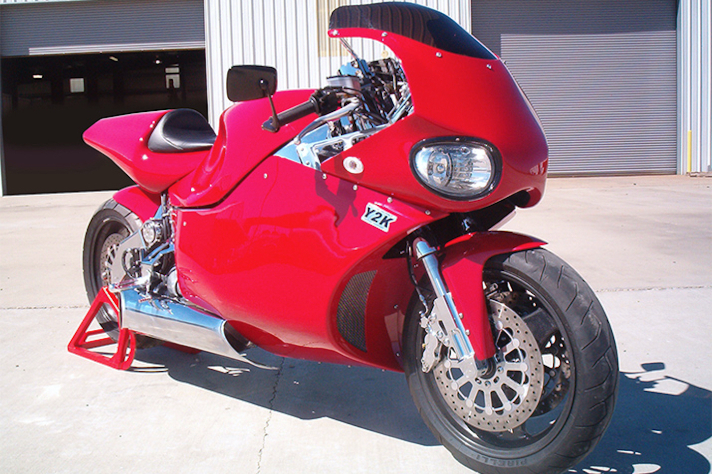 Red 2000 MTT Y2K Superbike in broad daylight.