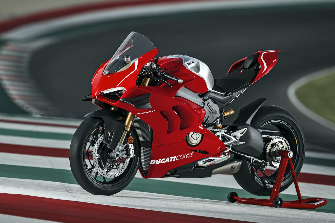 Shiny Red 2020 Ducati Panigale V4 R parked ourdoors.