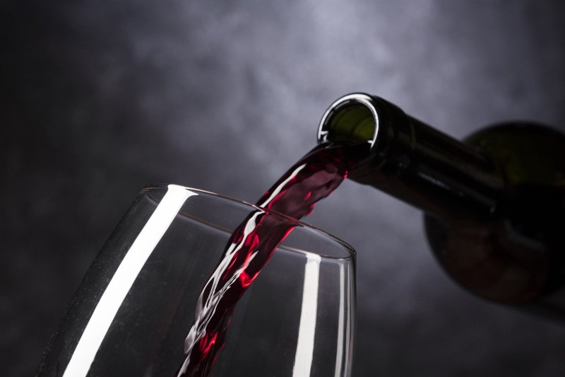 Red wine being poured into glass