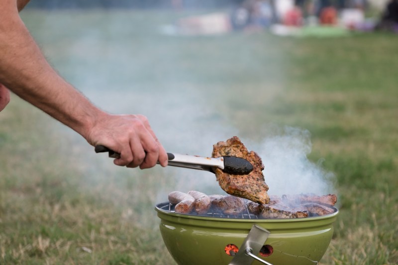 Person smoking meat