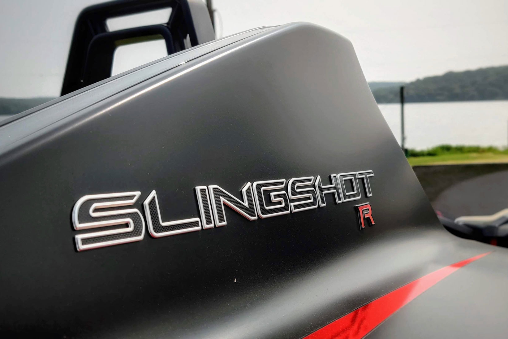 polaris slingshot r review emblem closeup