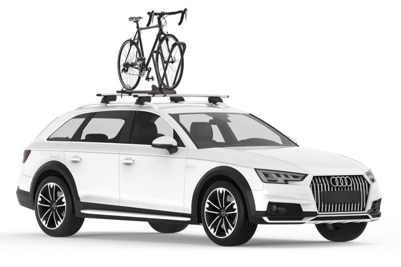 Yakima HighRoad roof-mounted bike rack on top of an Audi SUV.