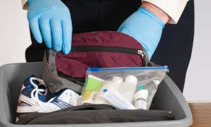 TSA going through toiletries