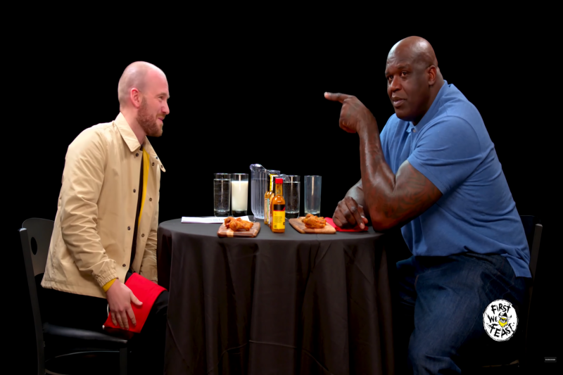 Sean Evans and Shaq in Hot Ones Interview 2021