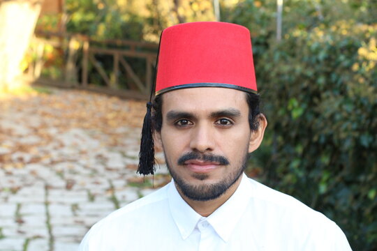 Man in a fez hat