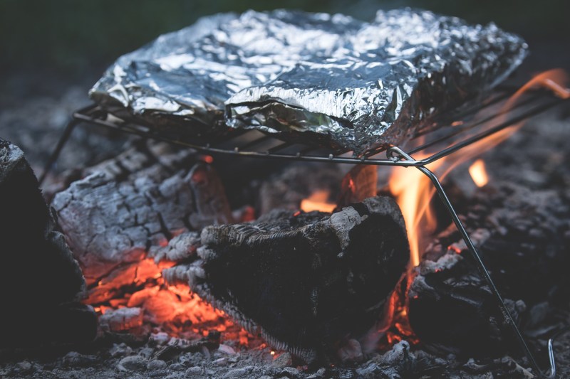 Campfire with grill grate over it