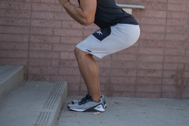 Man performing a jump squat