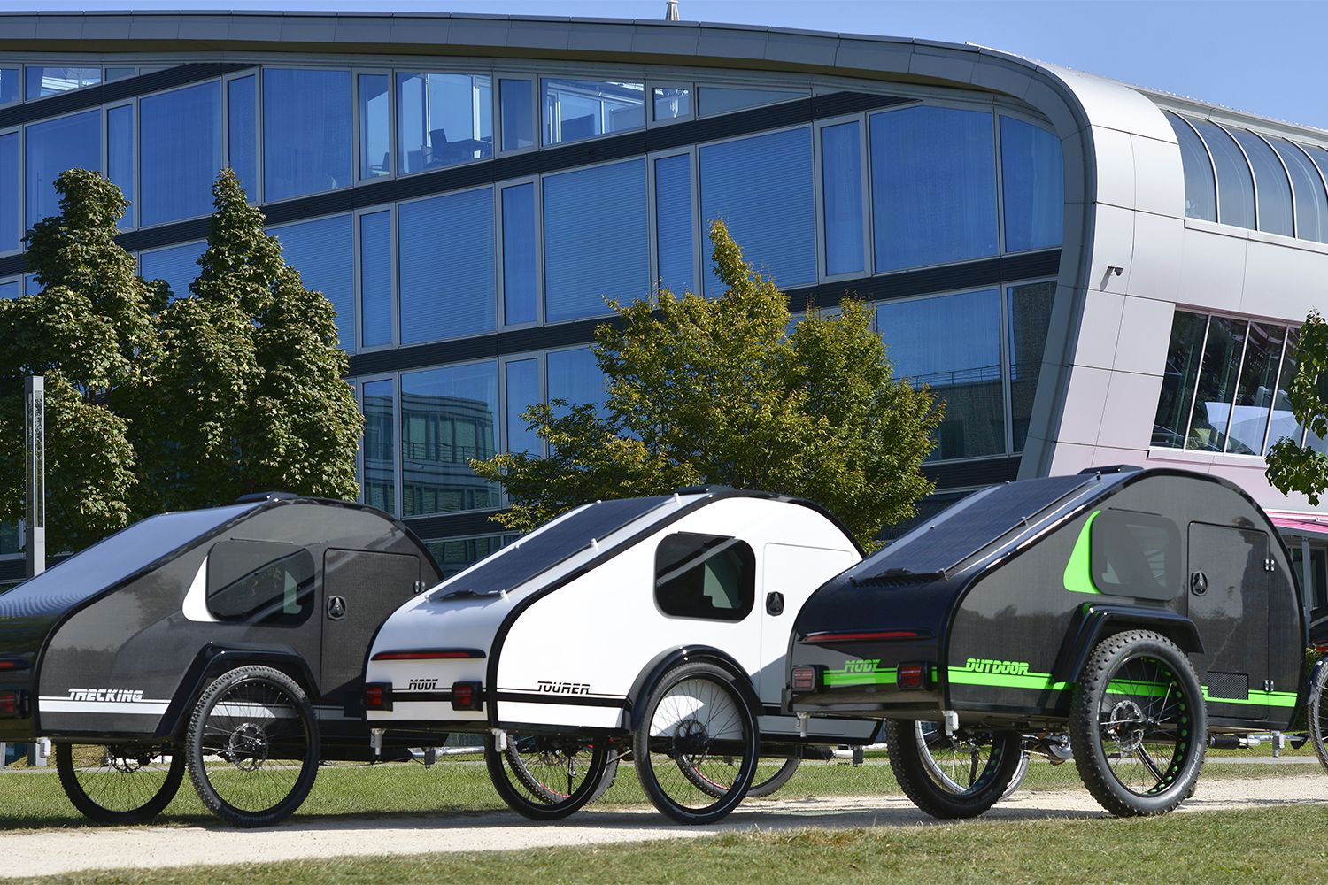 Lineup of ModyPlast Mody Teardrop Bikepacking Trailers