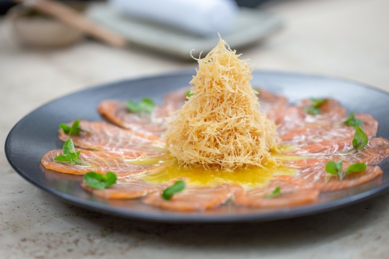 Your guide to the best Miami vacation - The Manual 12 Plate of thin sliced tuna at Osaka in Miami