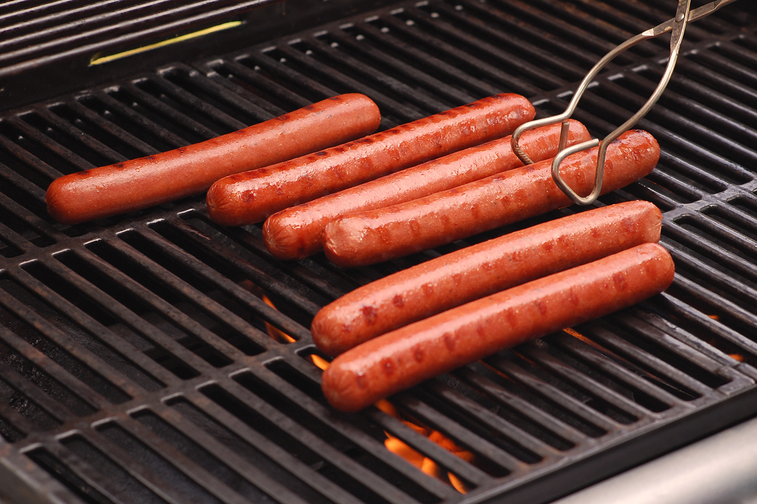 Hot dogs on a grill