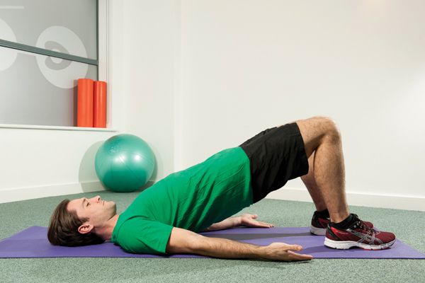 A man doing a glute bridge