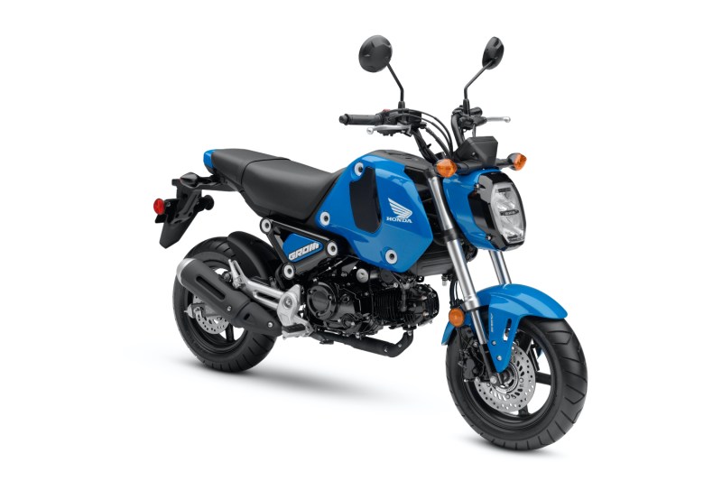 Front side profile view of the Honda Grom with a white backdrop.