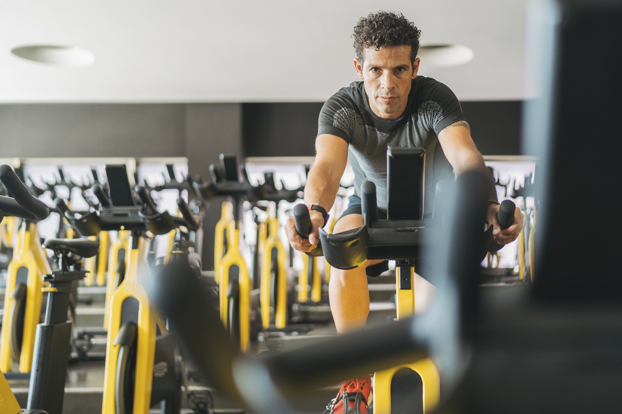 Man riding an exercise bike