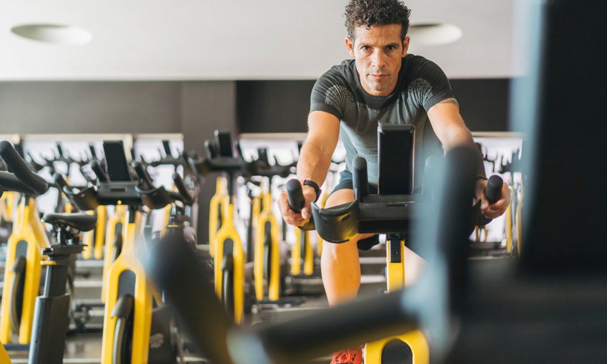 Man riding an exercise bike