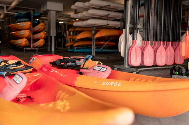 Two orange-and-red kayaks