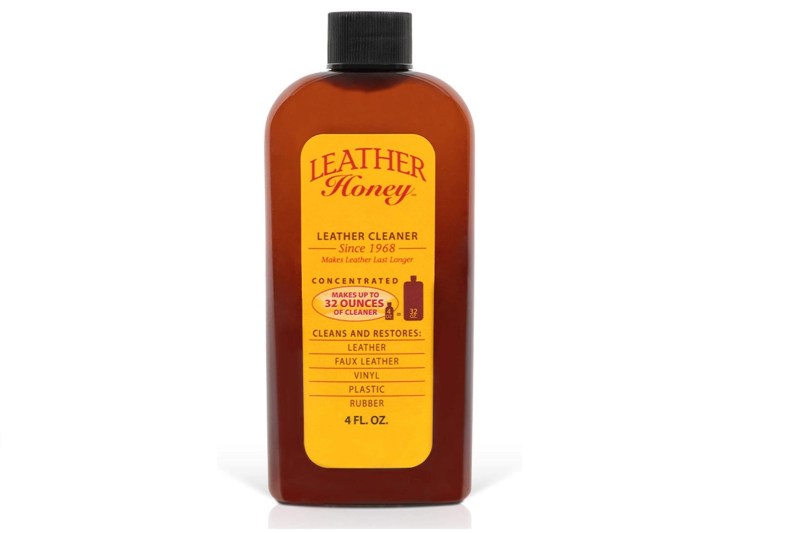 A bottle of Leather Honey Conditioner on a white background.