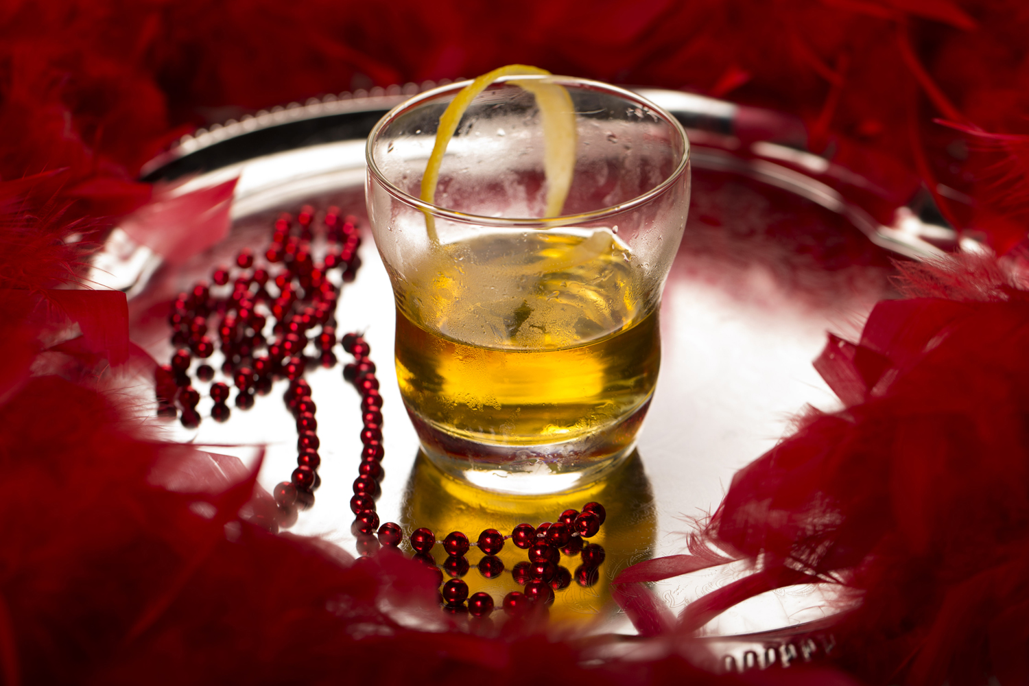 Sazerac (with the red feather boa) is the official cocktail of New Orleans for summer drinks