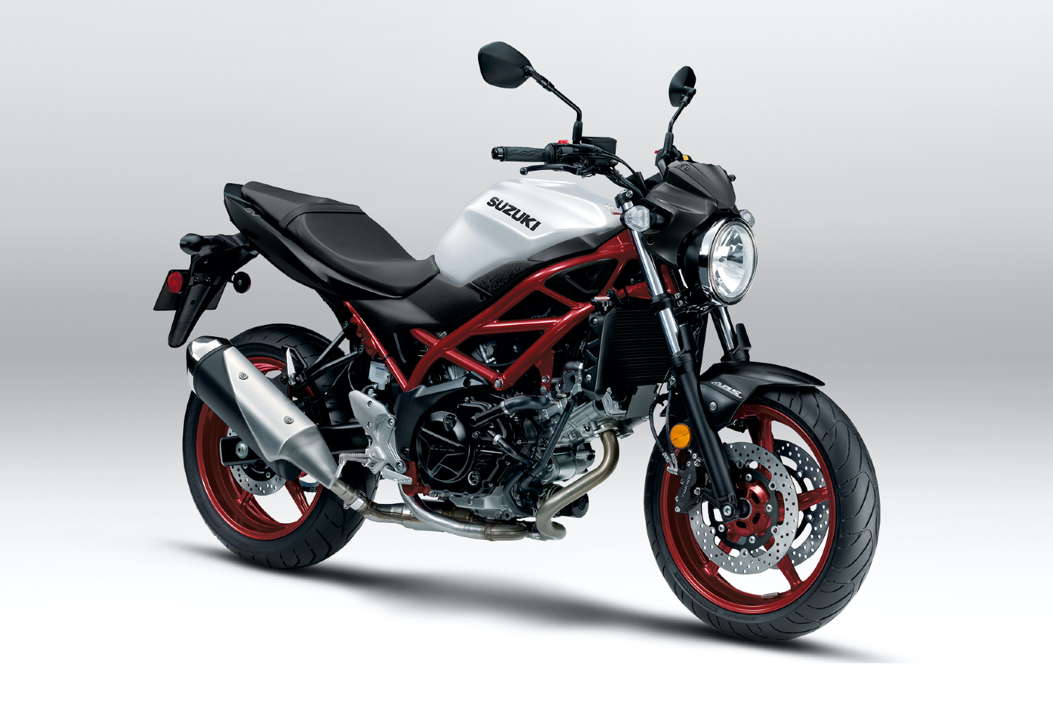 Front side profile of a Suzuki SV650 in a white backdrop. 