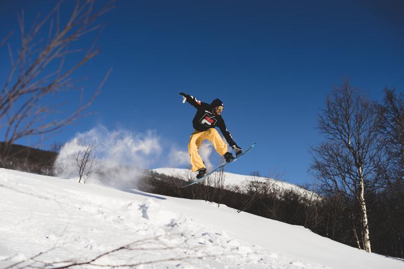 Snowboarder mid-flight