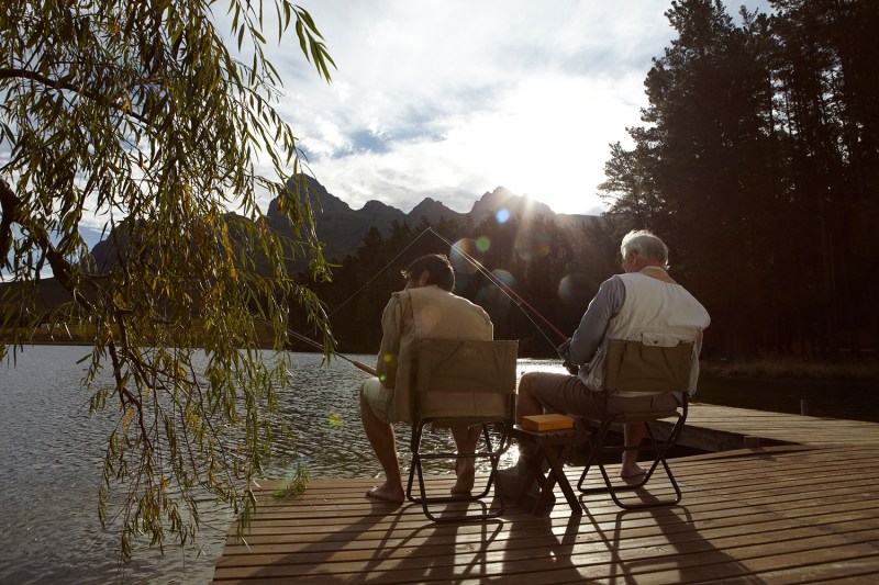 men fishing under the sun.