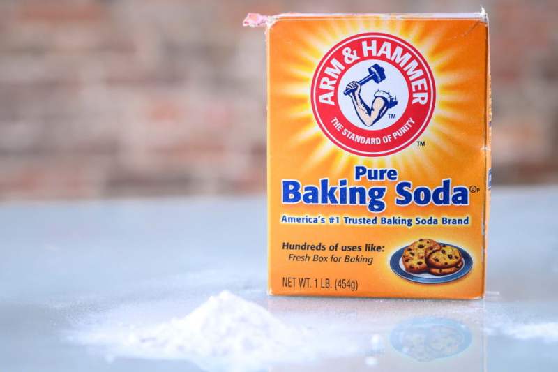 A box of Arm and Hammer baking soda on a table