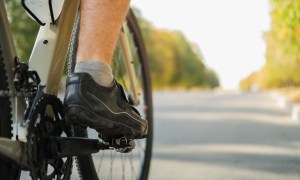 Man cycling on road