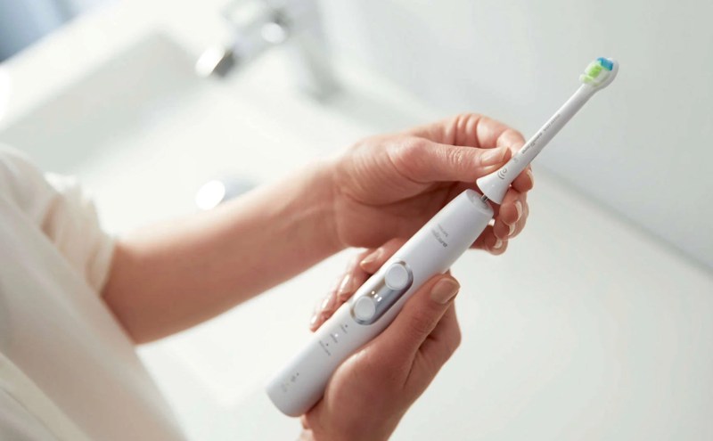 replacing an electric toothbrush head