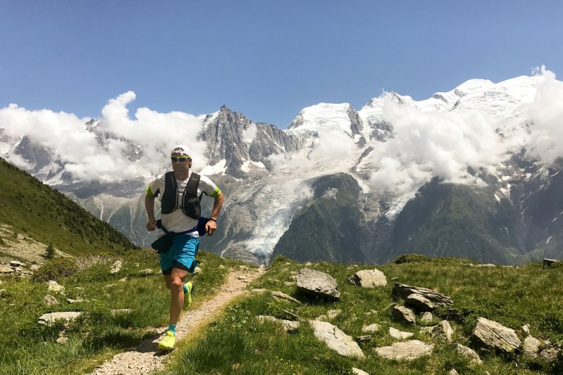 Man running on trail.