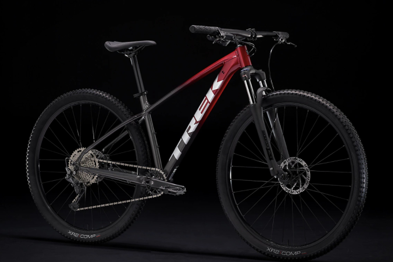 Trek Marlin 6 (Gen 2) mountain bike against a plain black studio backdrop.