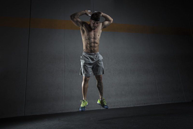 Man doing burpees.