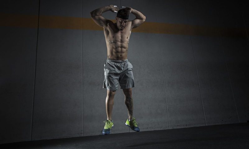 Man doing burpees.