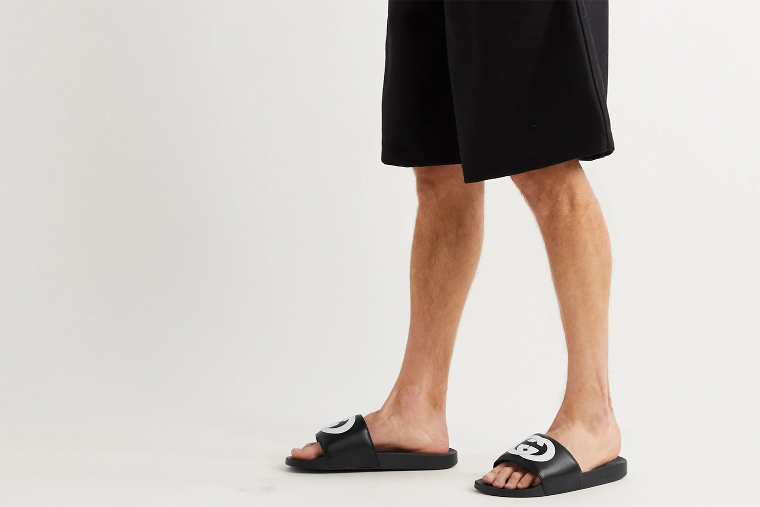 Make a splash with these designer men's pool slides to buy this summer