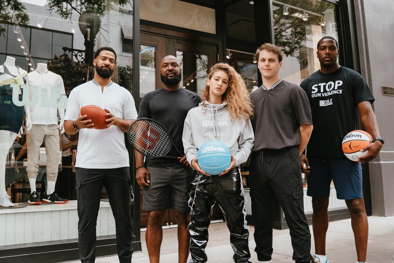 Group of people in front of wilson store