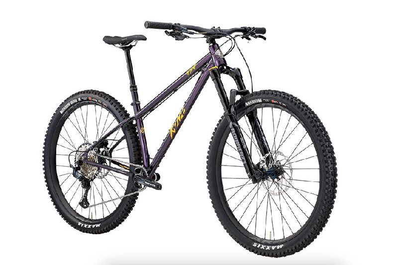 Kona Honzo bike in purple on a white studio background.