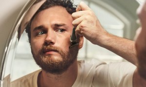 A man shaving his face